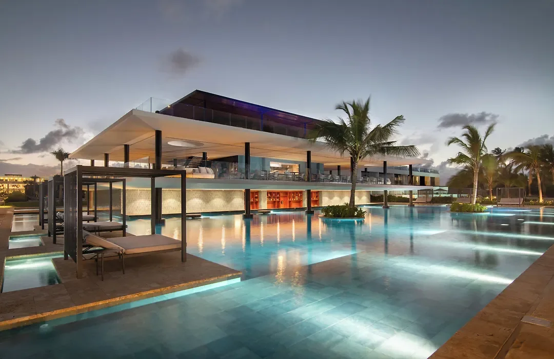Main pool and pool bar at dusk